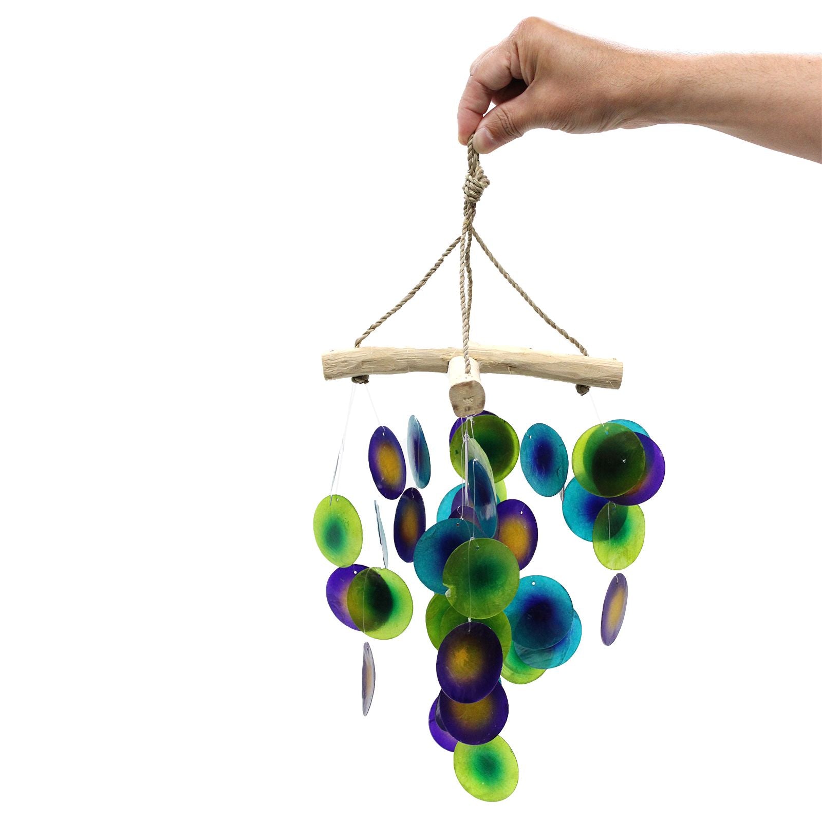 Handmade wind chime with colorful discs and natural wood elements on a white background