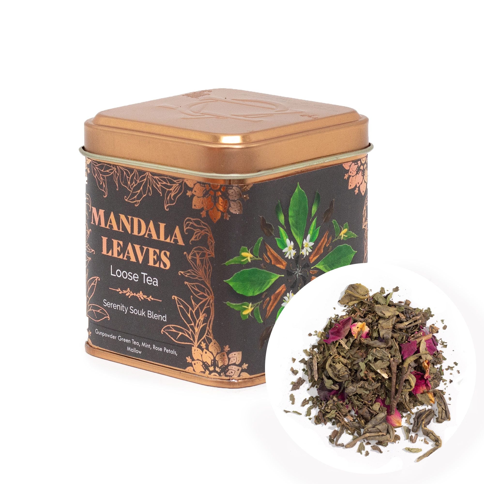 Tea canister labeled 'Mandala Leaves' with loose tea leaves spilling out on a white background