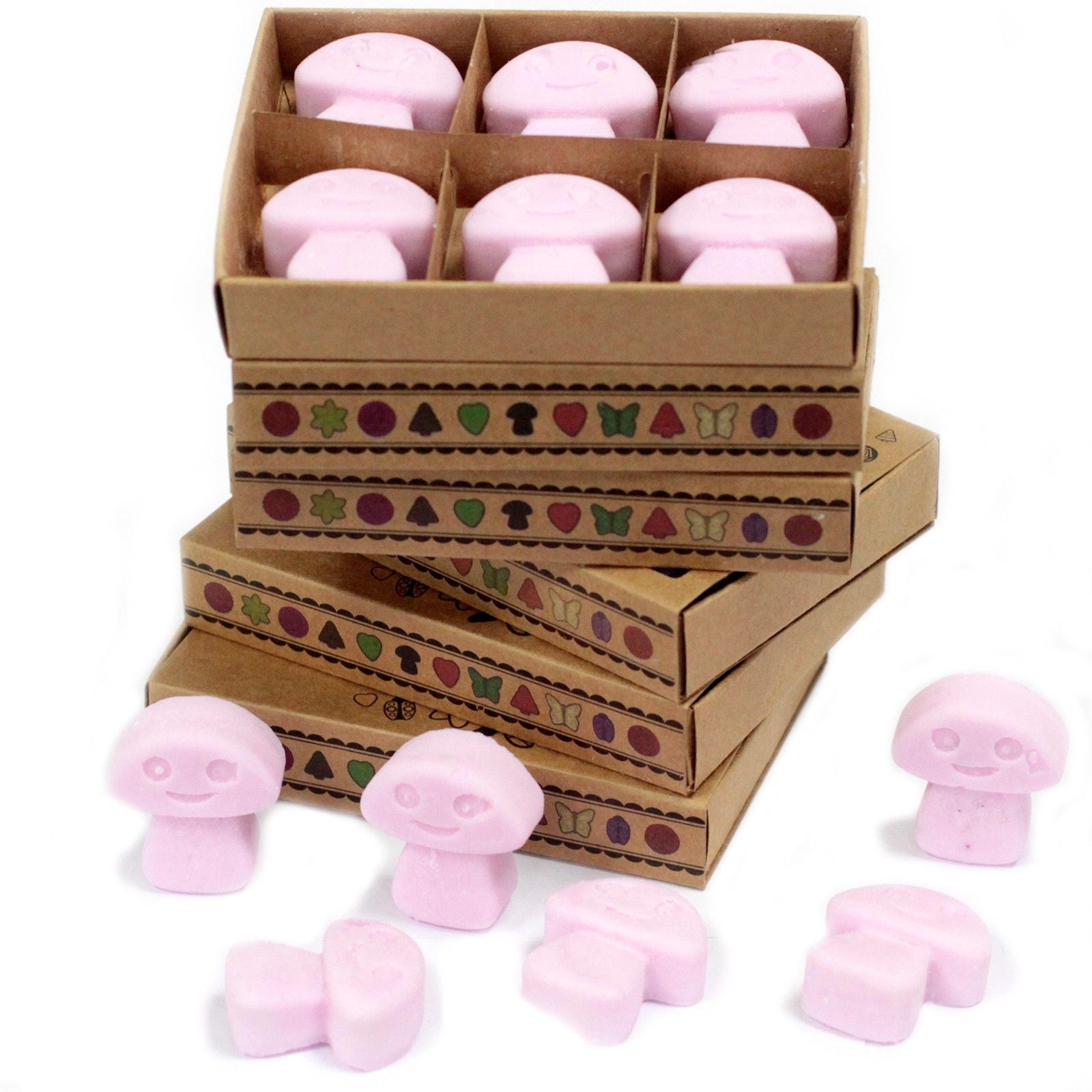 Pink mushroom-shaped objects with a cardboard box featuring illustrations.