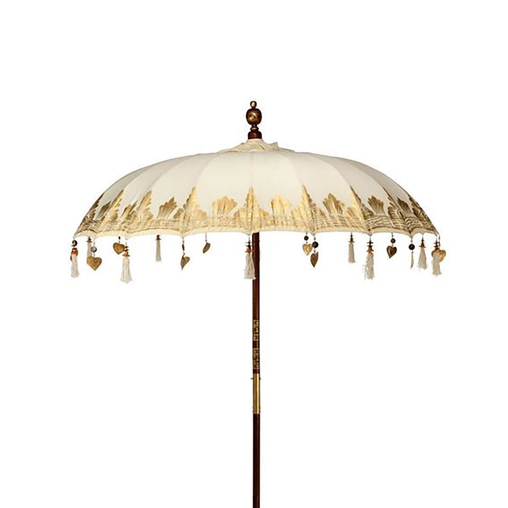 Decorative umbrella with tassels on a white background