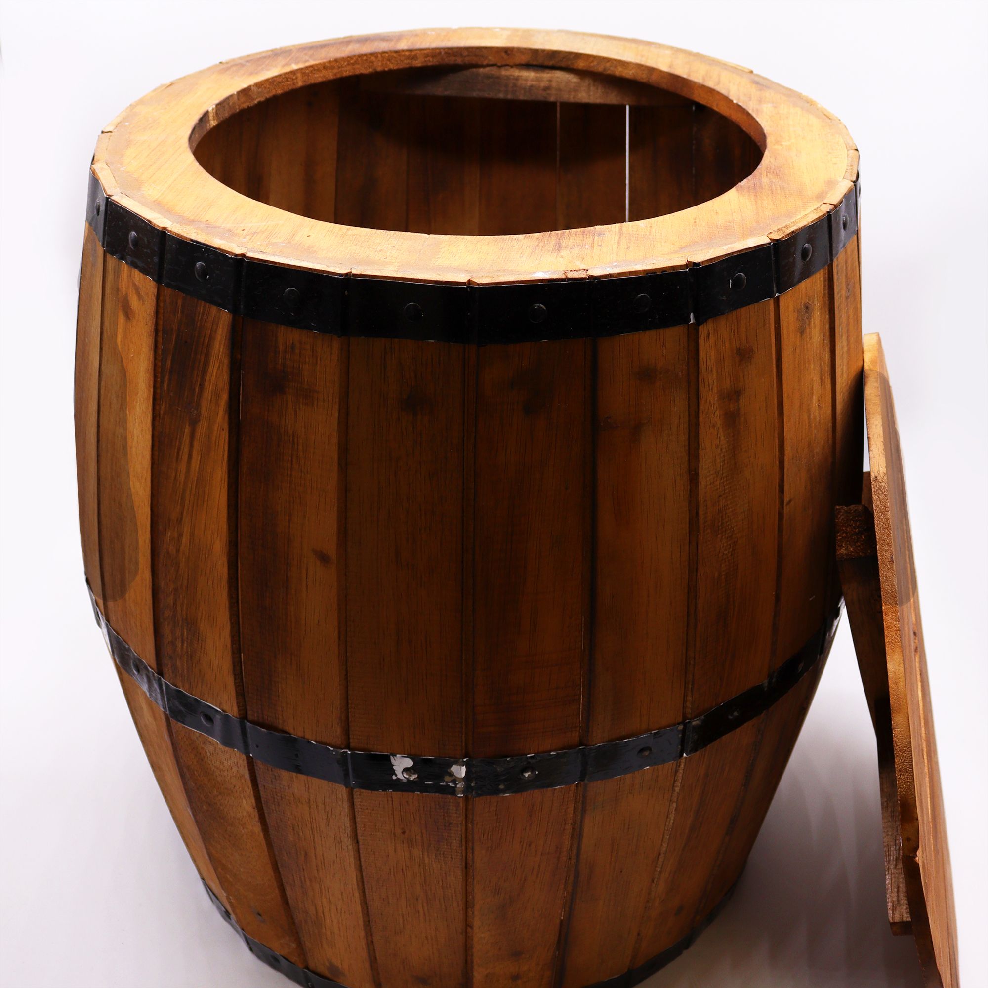 Wooden barrel with metal bands on a white background