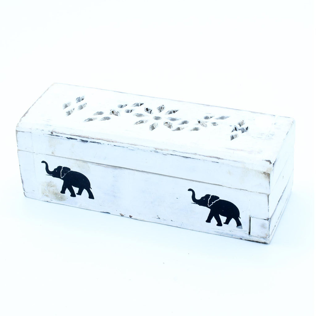 White wooden box with black elephant designs on a white background