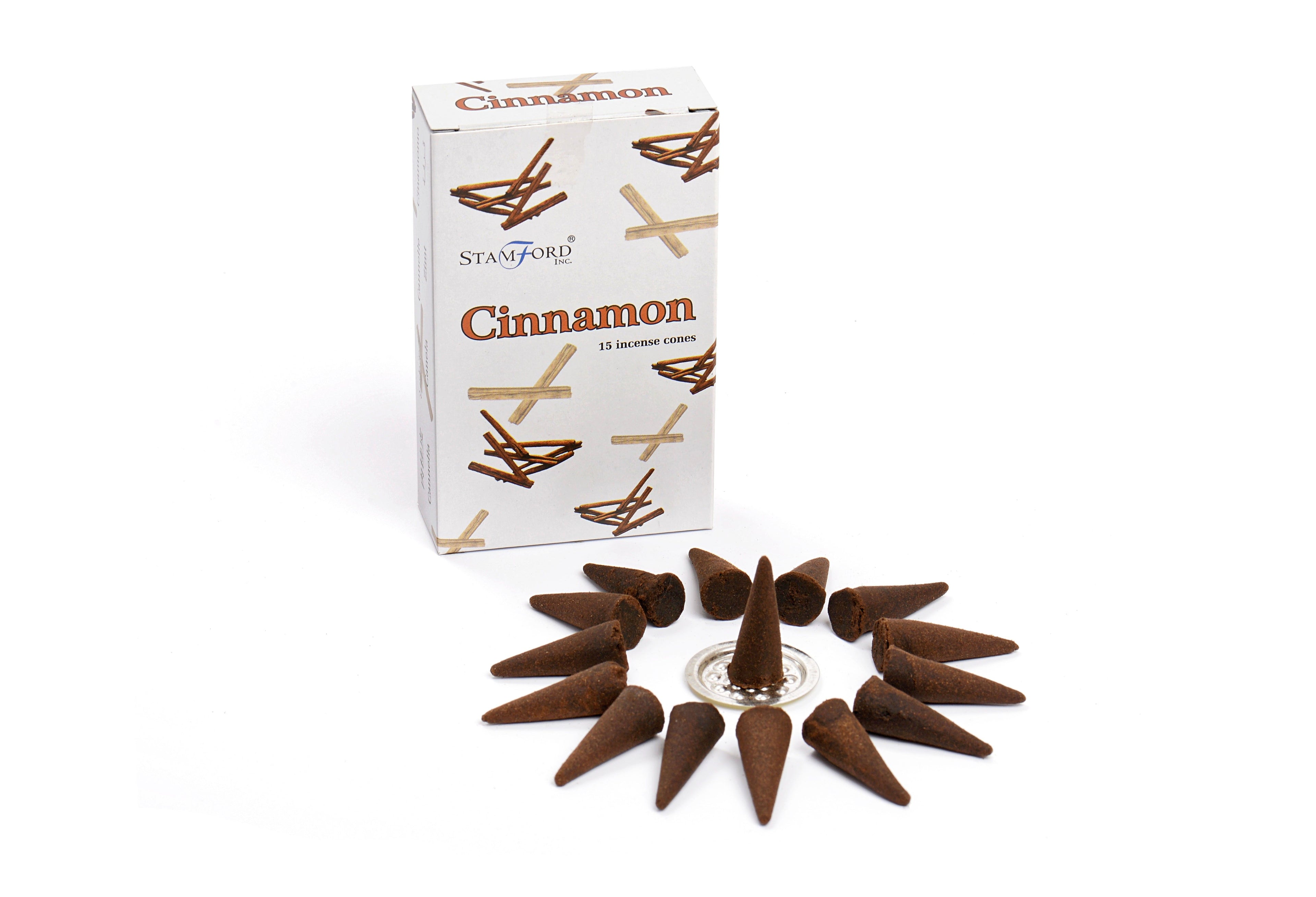 Cinnamon incense cones with packaging on a white background