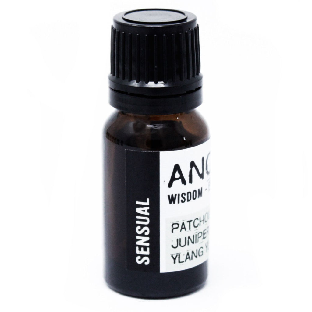 Small amber glass bottle with a black cap on a white background