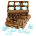 Stack of cardboard boxes with heart-shaped blue objects on a white background